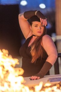 woman model in front of a fire