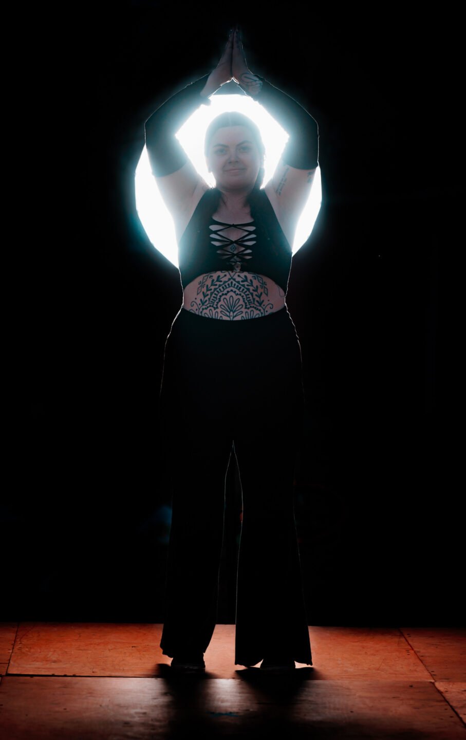 backlit model in black